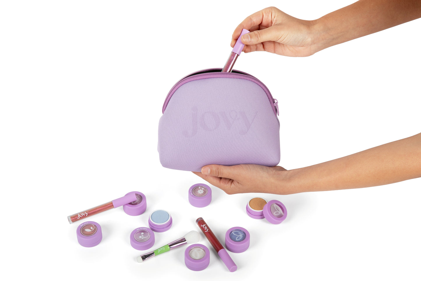Jovy Glow Up Makeup Set with Purple limited edition bag plus eyeshadows and lip glosses on a white background