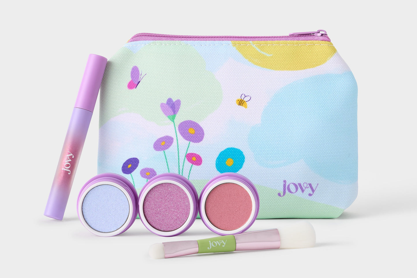 Open Jovy Berry Bliss Play Makeup Kit showing the three dual eyeshadow/blush colors, lip gloss, makeup bag, and duo makeup brush.