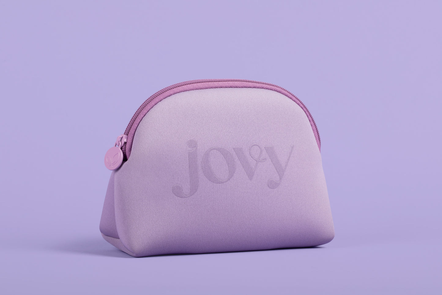 Jovy Glow Up Make Bag Limited Edition purple cosmetic bag on a light purple background